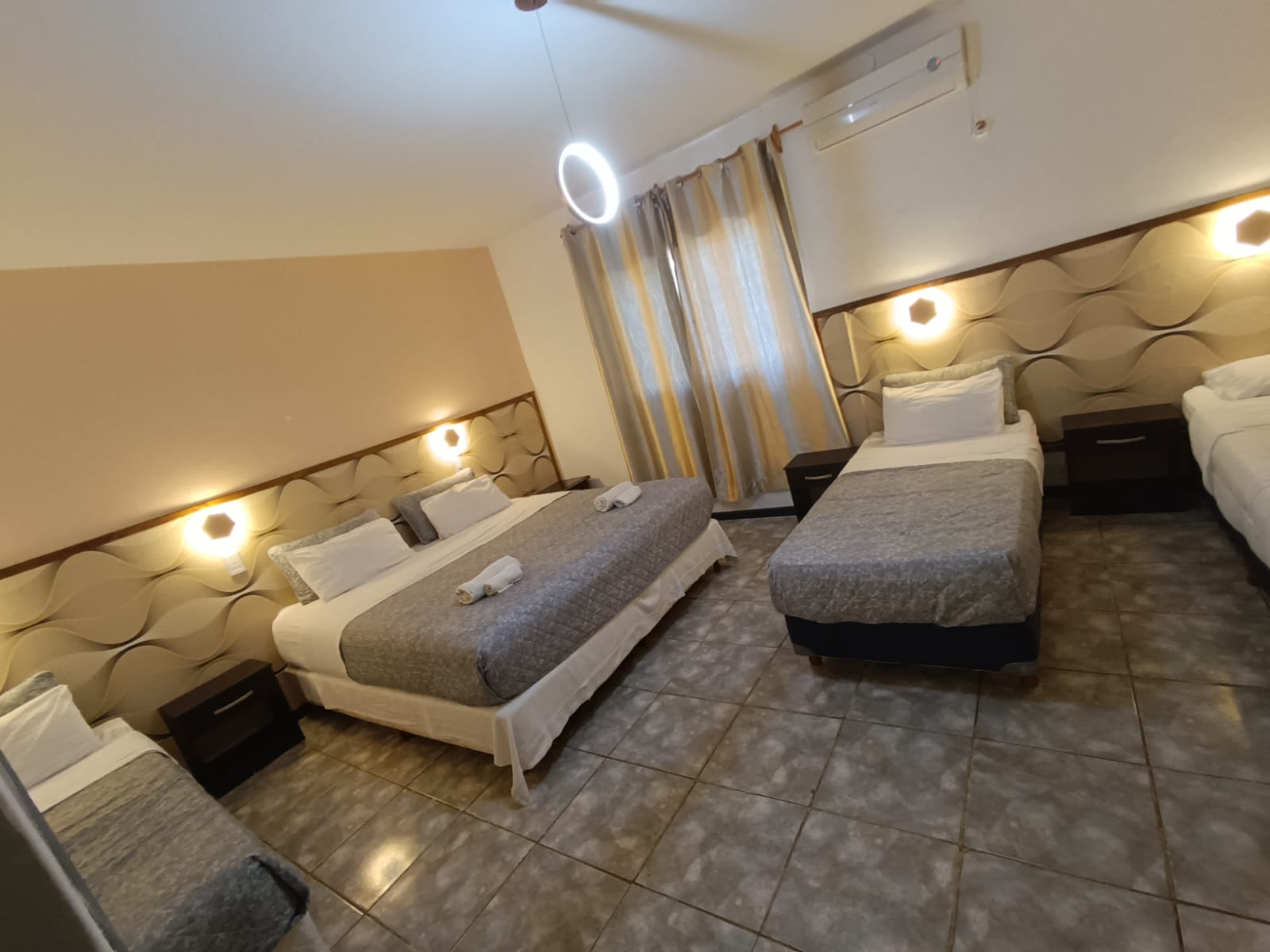 Habitación del Hotel La Gran Manzana